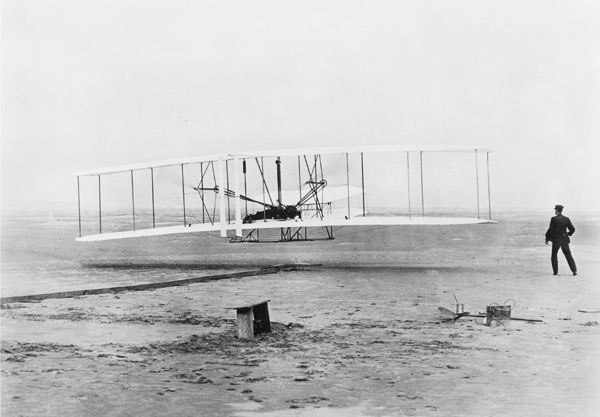Original Wright Brothers 1903 Aeroplane ("Kitty Hawk") in first flight..."