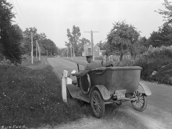 "Postman delivering mail, rural mail route, York county, Maine"