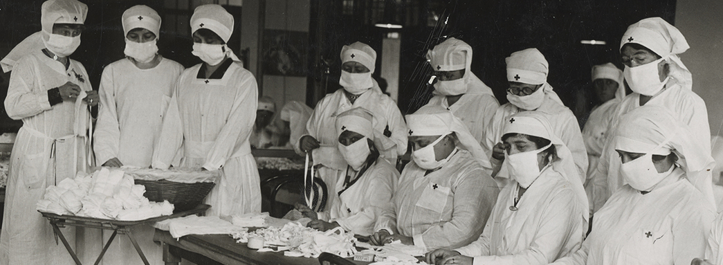 Red Cross workers make masks