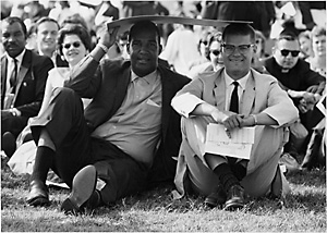 Sitting in sun during march on Washington, 1963