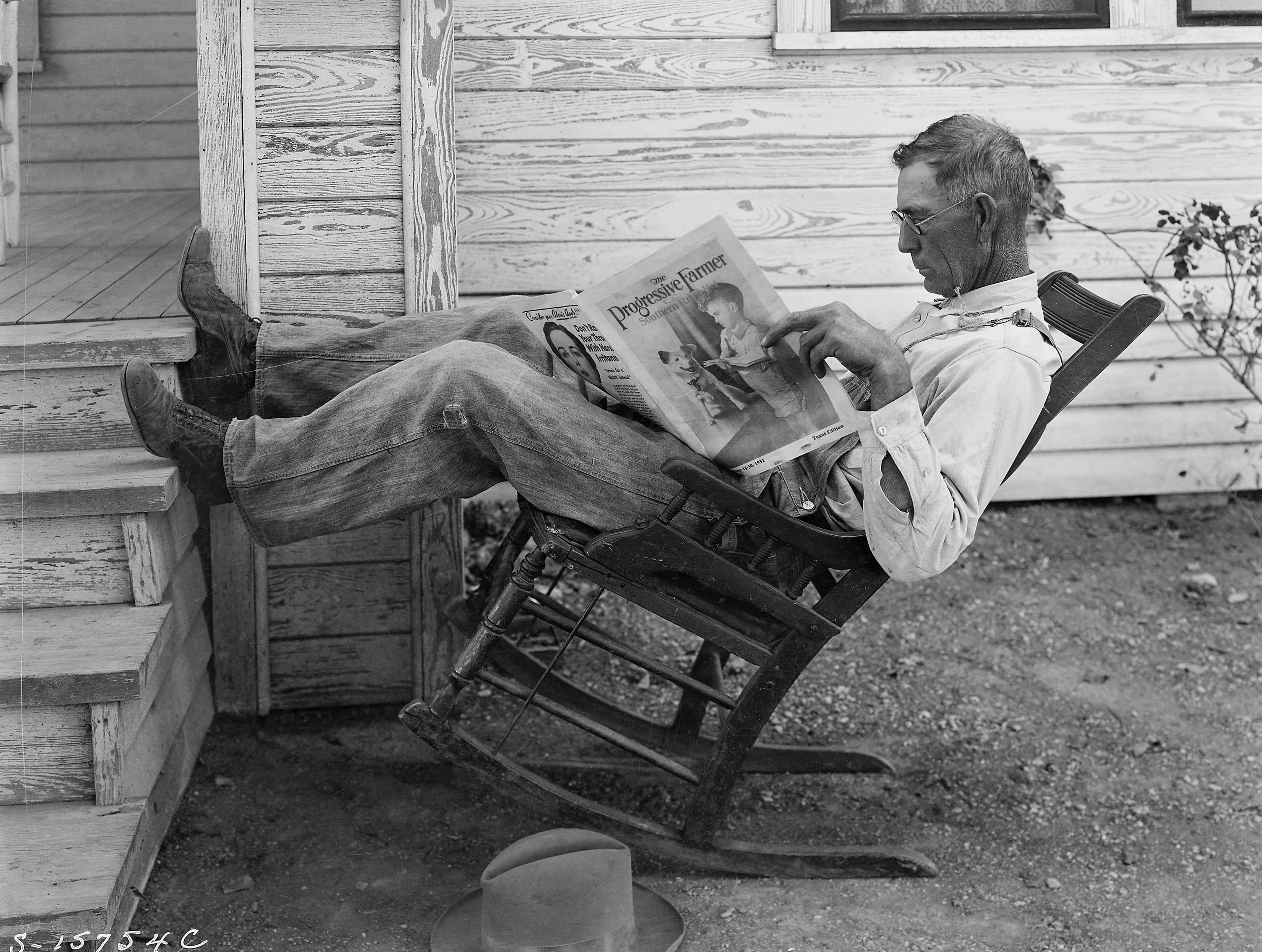 Farmer Reading His Farm Paper Coryell County Texas September 1931