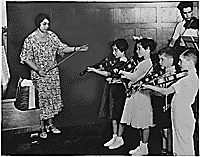 "Class in violin instruction under the direction of the WPA Federal Music Project in New York City," 1936. (FDR Presidential Library NLR-PHOCO-A-53227(1922))