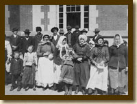 Immigrants Outside a Building on Ellis Island, early 20th century