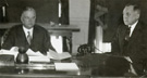 President Herbert Hoover in the Oval Office with Theodore Joslin, 1932
