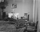 Hand-carved desk used by President Truman at the �Little White House� where he stayed during the Potsdam Conference, photograph by Lieutenant Newell, July 13, 1945