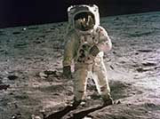 Astronaut Edwin Aldrin walks near the Lunar Module.