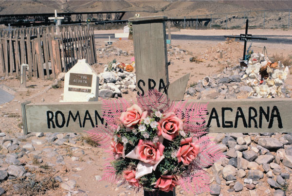 "Grave marker in Smelter cemetery, Asarco Smelter Works, in the background..."