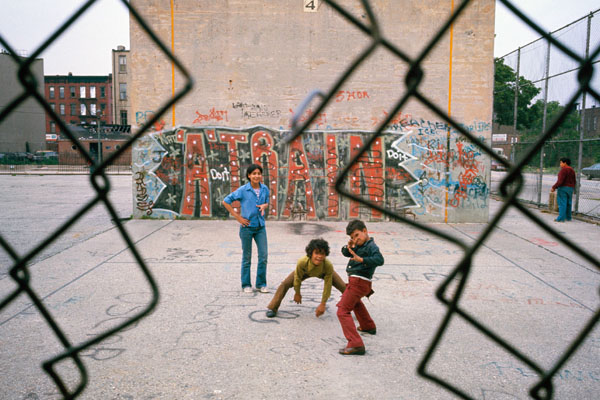 "Three boys and 'A Train' graffitin in Brooklyn's Lynch Park in New York City."