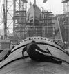 Man working on hull of U.S. Submarine at Electric Boat Co., Groton, Conn.
