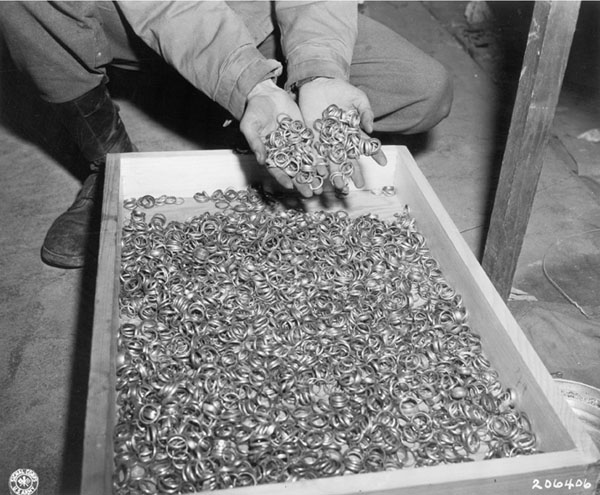 "A few of the thousands of wedding rings the Germans removed from their victims to salvage the gold..."
