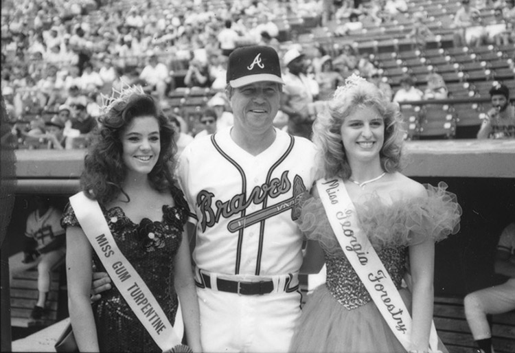 Russ Nixon with Miss Gum Turpentine 
and Miss Georgia Forestry