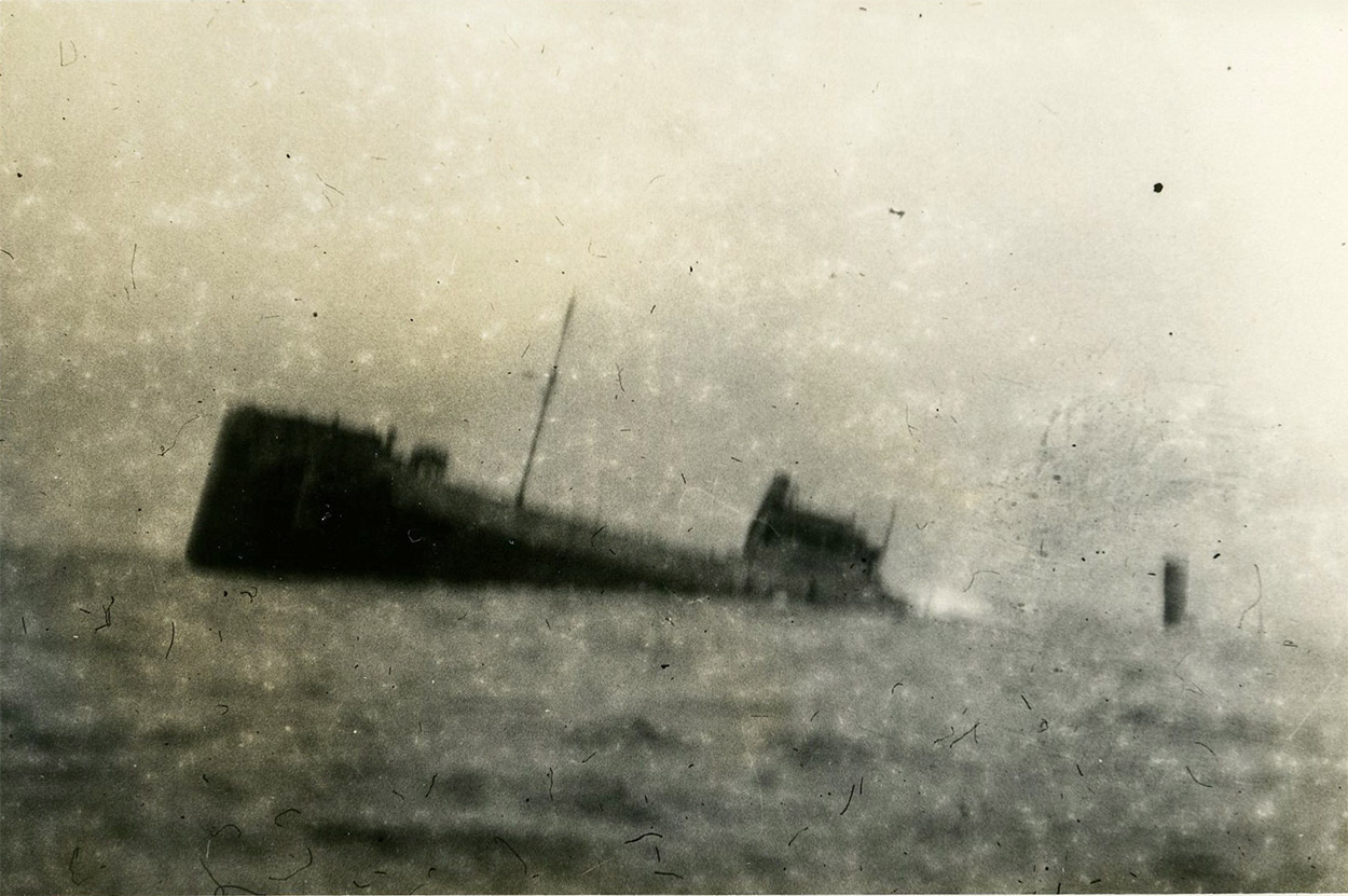 Sinking Ship After Sub Attack