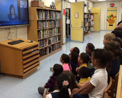 Children watching a distance learning program