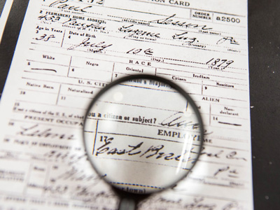 Magnifying glass on document