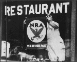 Woman Hanging NRA Poster in Restaurant Window, ca. 1934