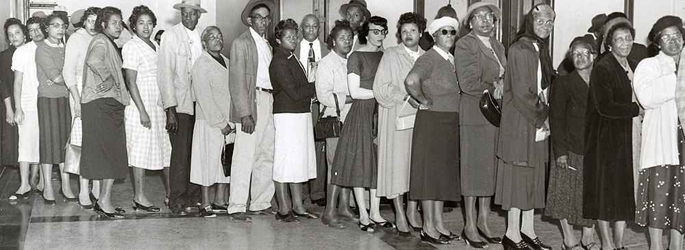 African American voters line up at polling place