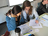 Students Looking at a Document