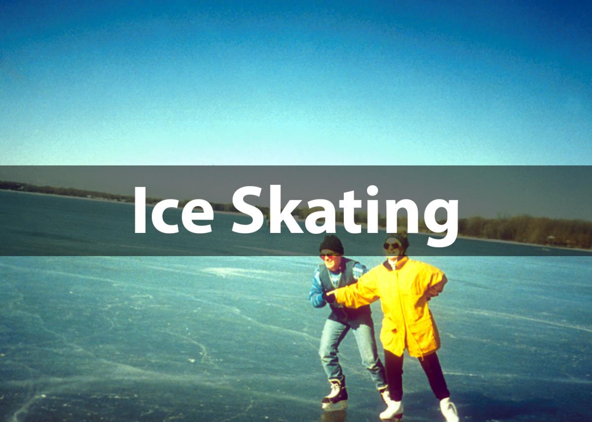 Color photo of two people skating on a lake