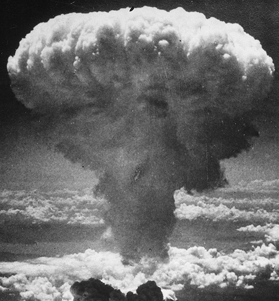 Mushroom cloud rises over Nagasaki after the explosion of an atomic bomb on August 9, 1945