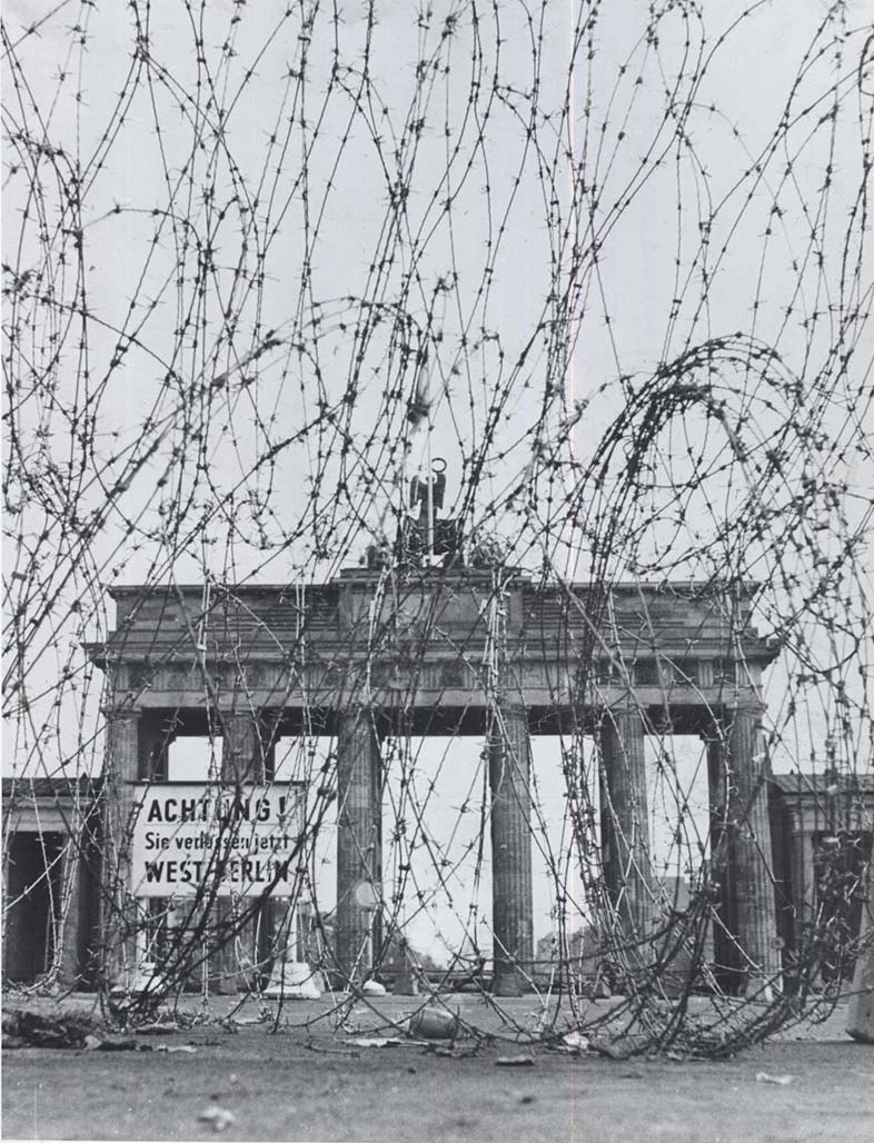 Brandenburg Gate Seen Through Barbed wire Barrier Erected By The East Berlin Police