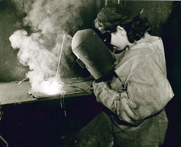 A woman welding