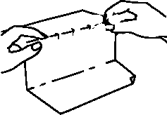 Hands incorrectly opening a document by back-folding it along a crease.