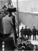 President Nixon views the Berlin Wall from a platform