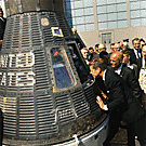 President John F. Kennedy viewing astronaut John Glenn's space capsule