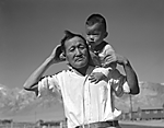 Grandfather and grandson of Japanese ancestry at the War Relocation Authority center