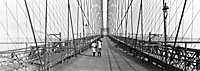 Pedestrians on the upper deck promenade of Brooklyn Bridge
