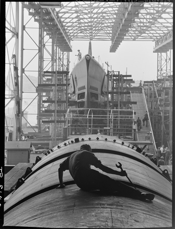 Man working on construction of a submarine 