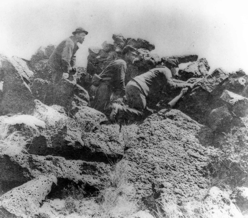 Soldiers fought their way cautiously through the natural fortress of the Lava Beds