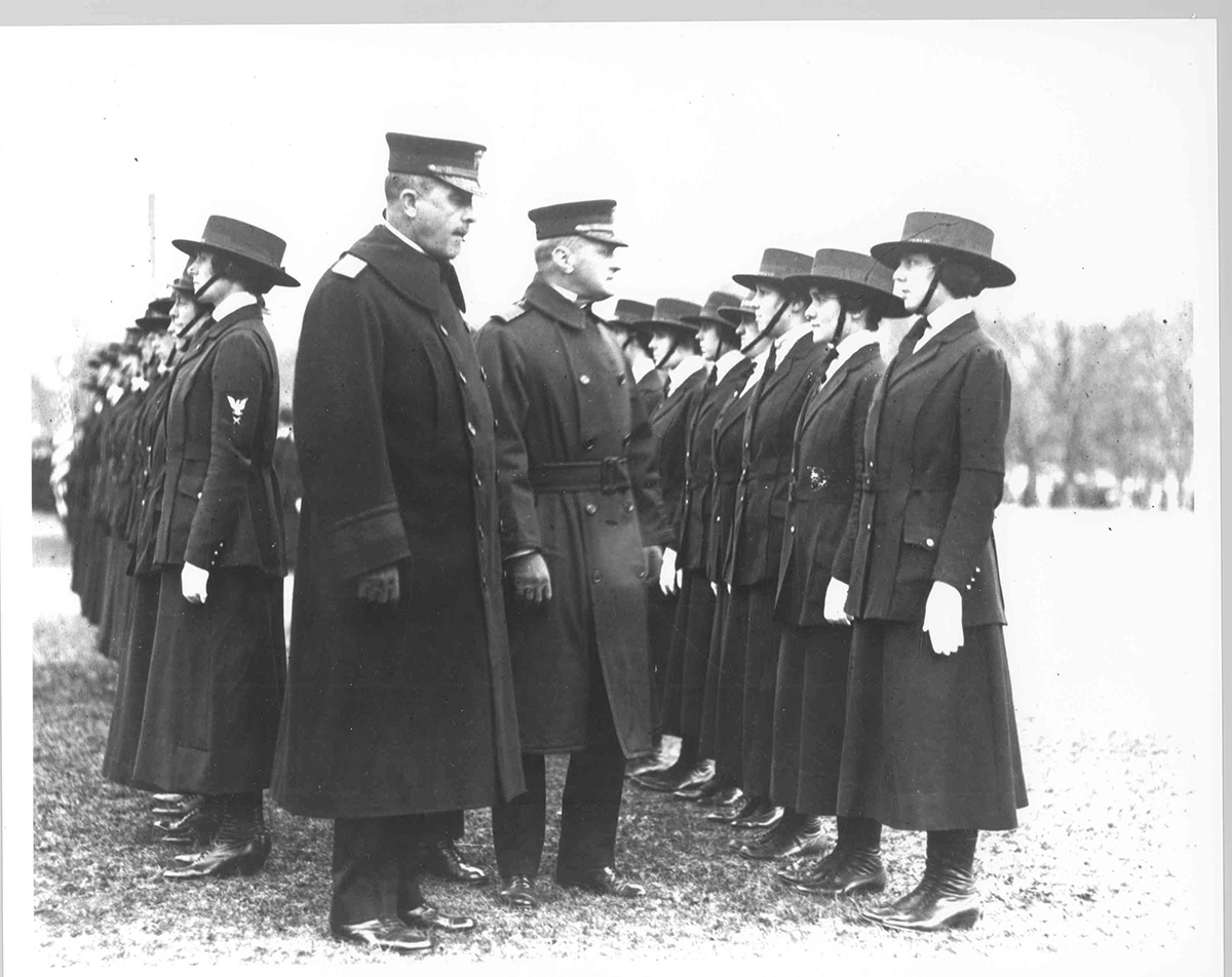 Rear Adm. Victor Blue (left center) chief of the Bureau of Navigation, inspects yeomen (F)