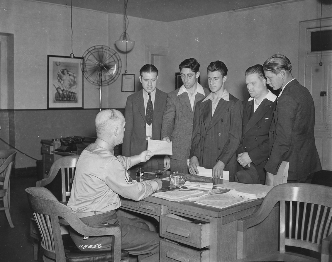 Army recruits receive applications at the New York Recruiting Office 1940