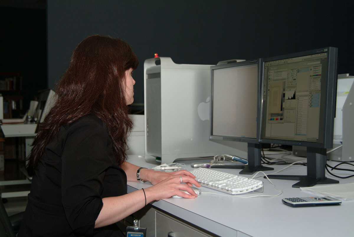 In the Digital Imaging Laboratory, Jennifer Seitz inspects scanned images.