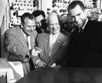 Vice President Richard Nixon and Soviet Premier Nikita Khrushchev watch the playback of their videotaped exchange at the Ampex Exhibit at the 1959 Moscow Trade Fair.