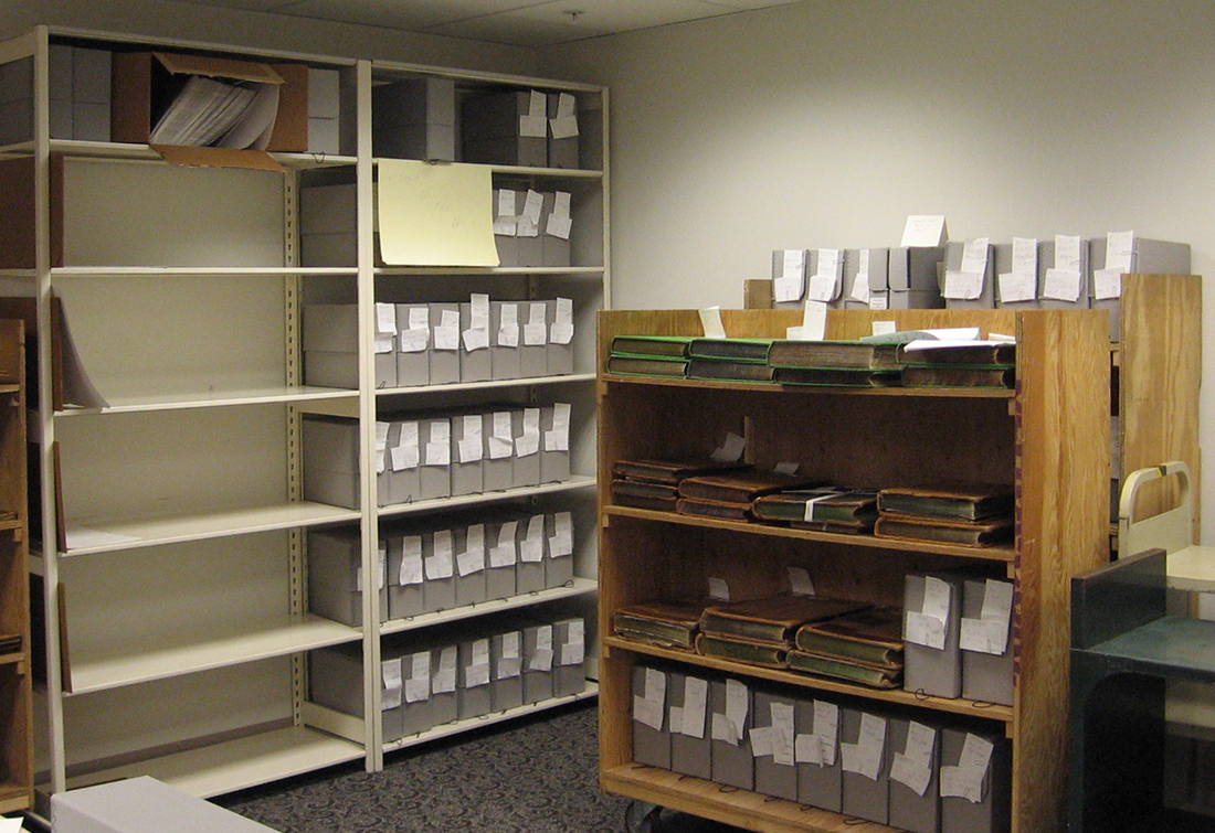Nineteenth-century records of the Military Department of the Pacific await transport to the microfilm lab for reformatting. 