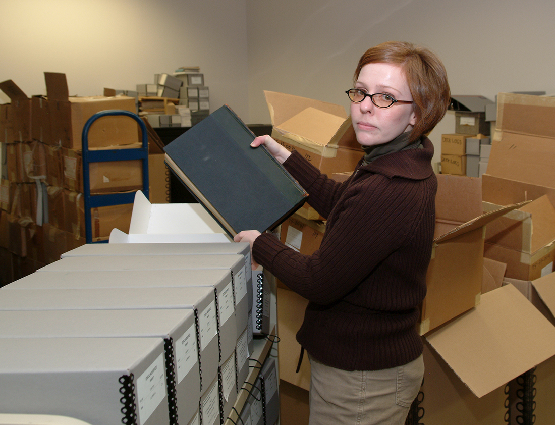 Dawn Sherman reboxes volumes in the effort to process Department of State consular post records