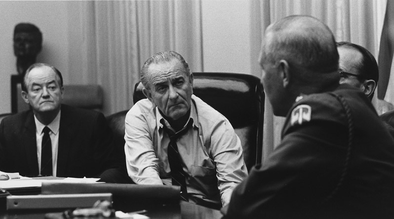 President Johnson listens to Gen. Creighton Abrams, then U.S. military commander in Vietnam, during a National Security Council meeting