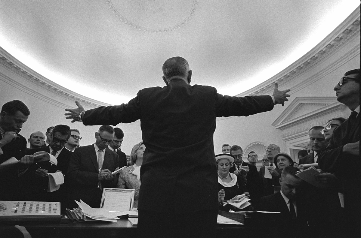 President Lyndon Johnson speaks to the press in the Oval Office, June 17, 1965.