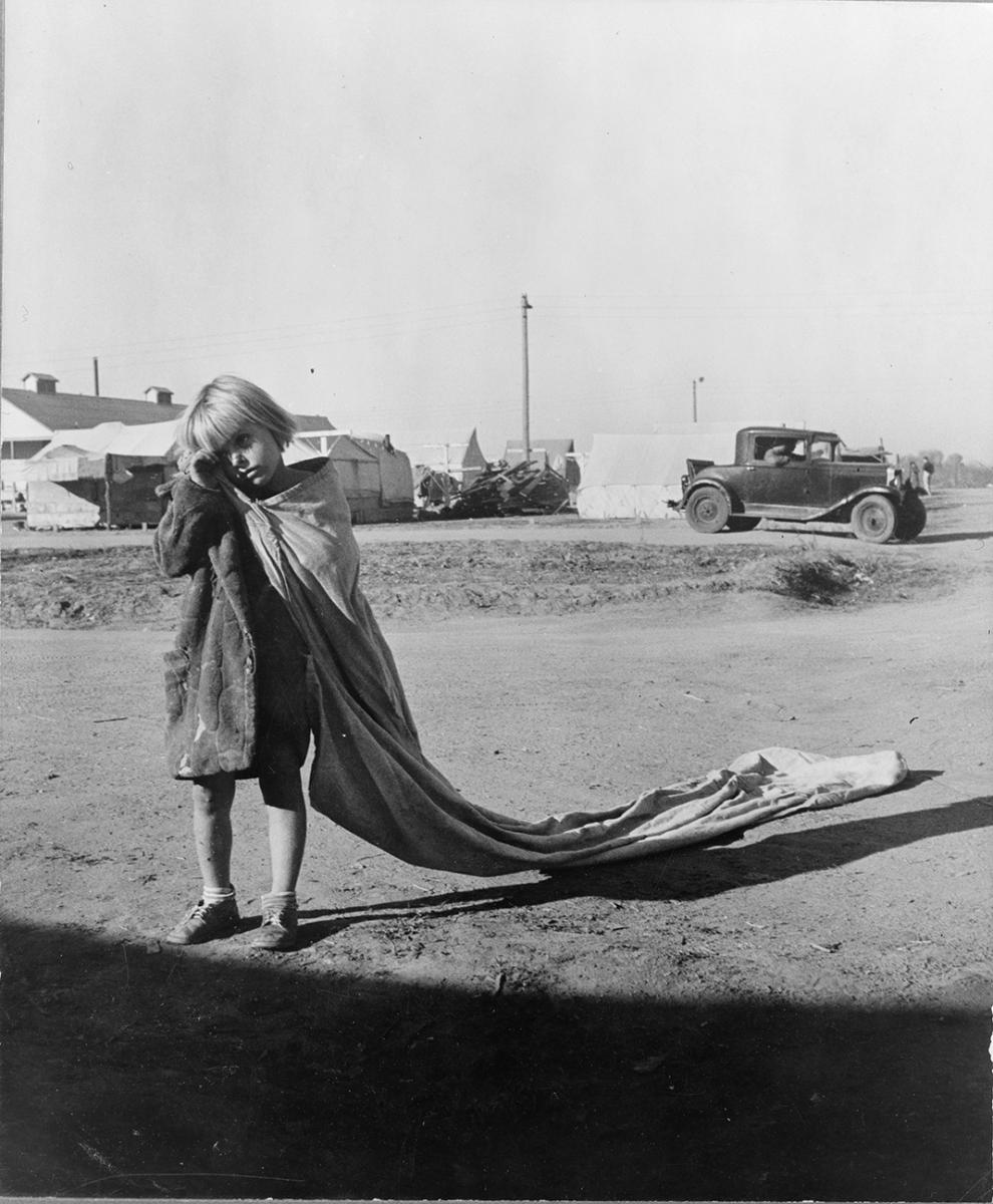 A young cotton picker at the Kern County migrant camp, photo by Dorothea Lange, November 1936