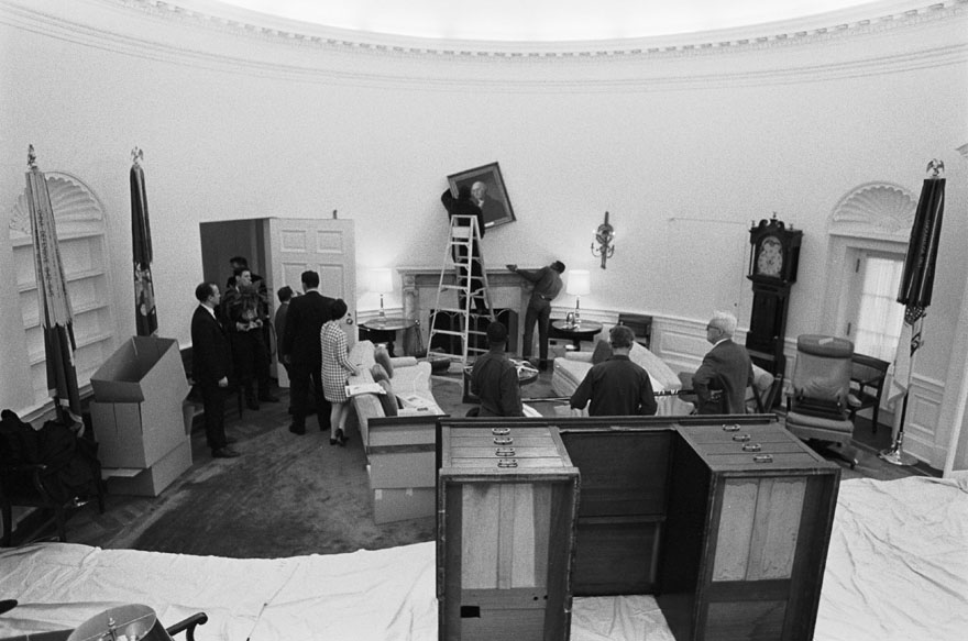 The Nixon staff moves into the Oval Office on January 20, 1969. 