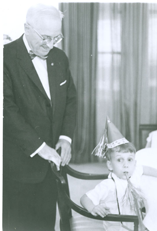 President Harry S. Truman with the author on his birthday in the family's New York City apartment. (
