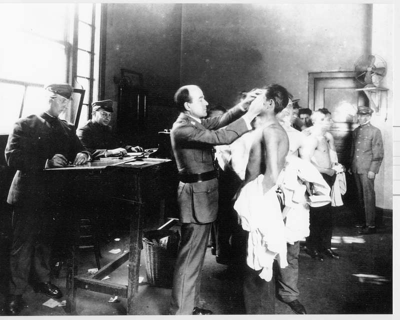 Health inspectors examine detainees on Angel Island, ca. 1917