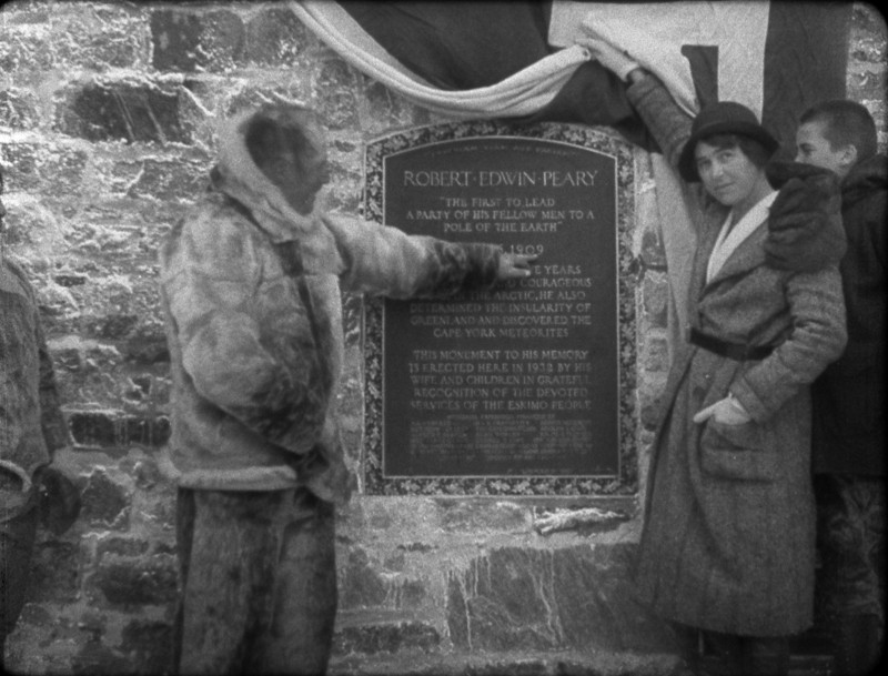 Bob Bartlett and Marie Peary Stafford unveil the dedication plaque on the Peary Monument