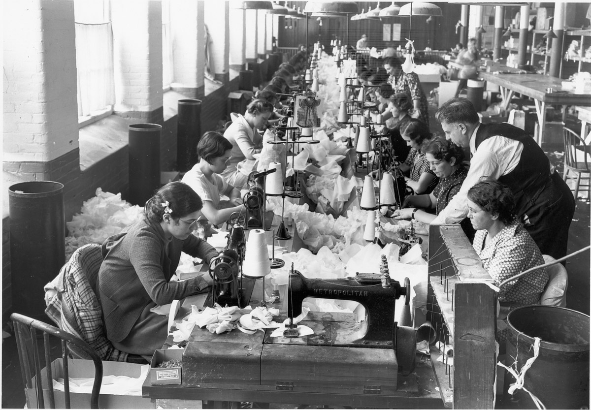 A sewing machine group at the Paragon Rubber Co. and American Character Doll