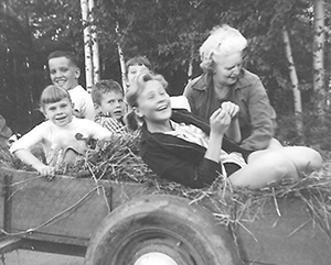 Old family photo f family on a hay ride