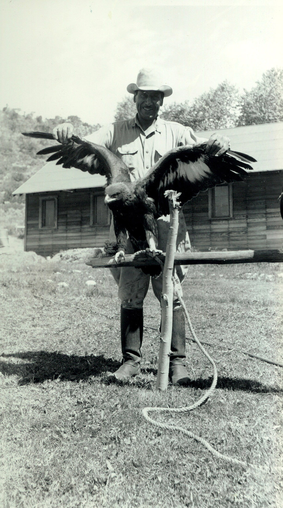 Senior Foreman Carnes La Rose shows off the camp eagle at the Uintah and Ouray Agency