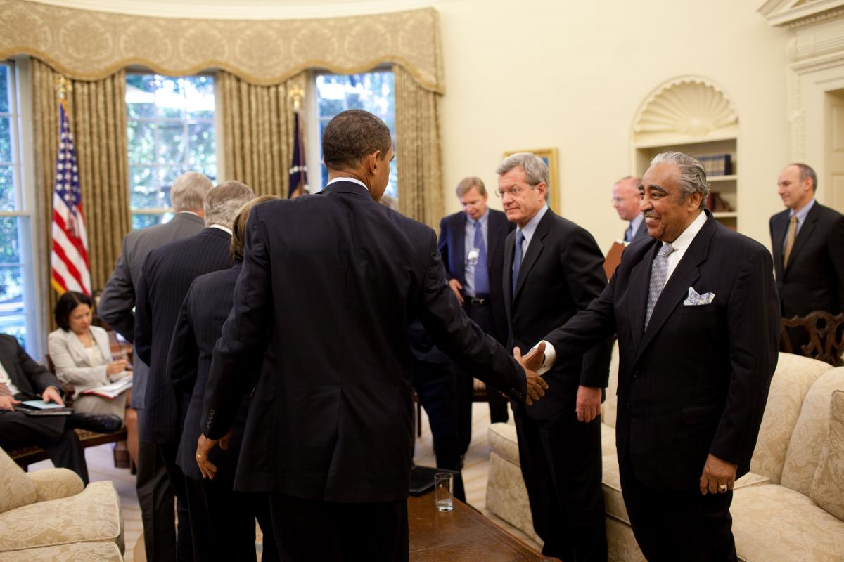 Charles Rangel shakes hands with Barack Obama