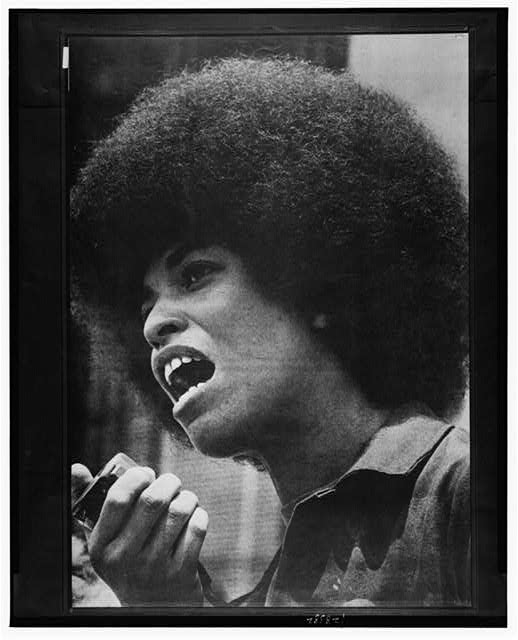 Angela Davis with speaker in her hand